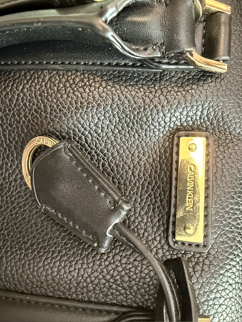 Calvin Klein Black Pebbled Leather bag with Gold Accents